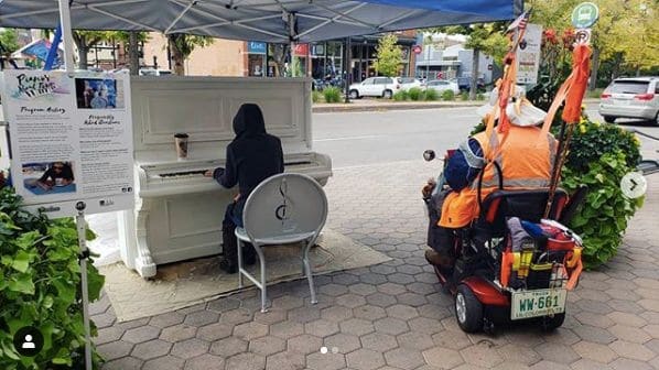 Photo of Downtown Fort Collins at Thamel Import Gift Shop, 19, Old Town Square, Fort Collins, Larimer County, Colorado, 80524, United States. The Lonesome Troubadour piano being…